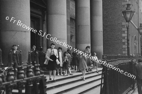 GARDINER STREET PEOPLE LEAVING ST F.X.CHURCH